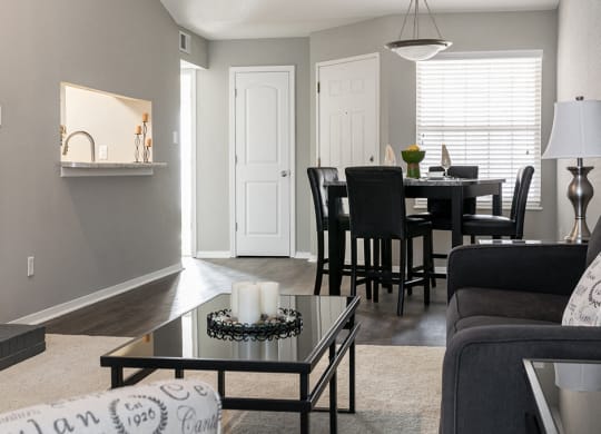 Open Concept Carpeted Living Room and Dining Room with Wood Style Flooring