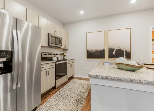 Kitchen with Granite Countertops and Stainless Steel Appliances