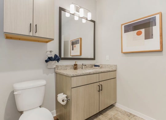 Bathroom With Granite Vanities