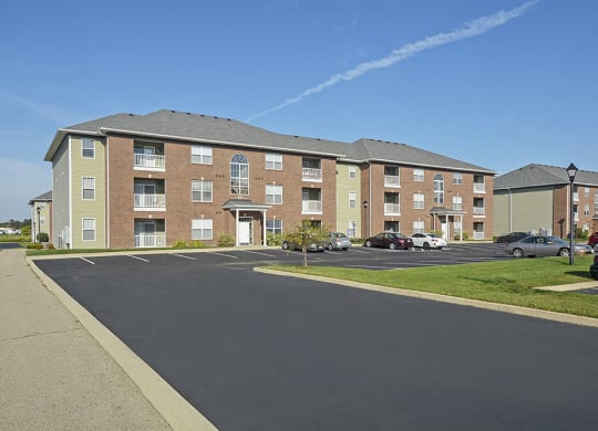Exterior of a Towne Park Apartment Building with Parking