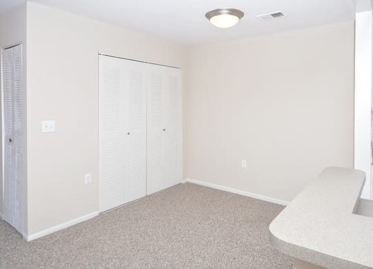 Dining Room Area with Accordion Style Closet