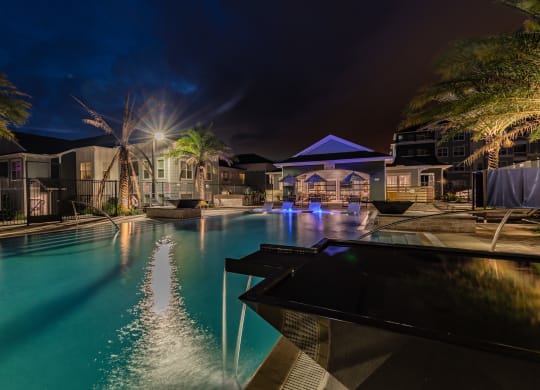 Resort-Style Pool Lit Up At Night