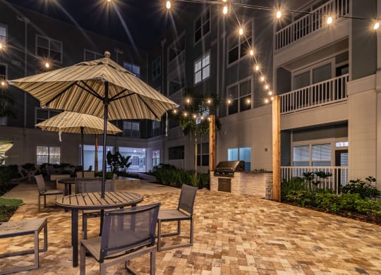Outdoor Pool Sundeck Lit Up At Night