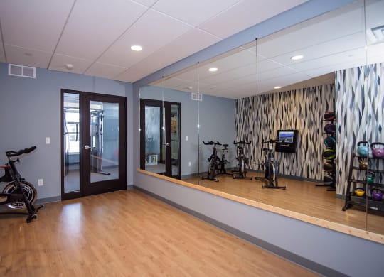 Fitness Studio with Large Wall Mirrors