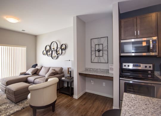 Open Concept Living Room and Kitchen with Built-In Wall Desk