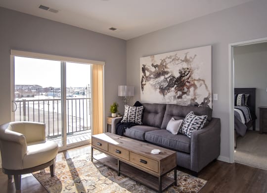 Living Room with Wood Style Flooring and Tall Ceilings