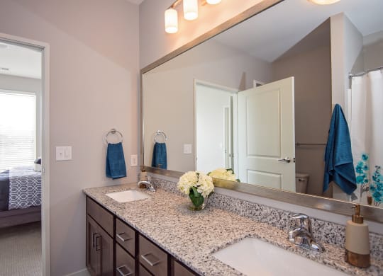 Spacious Bathroom Leading to an Attached Bedroom