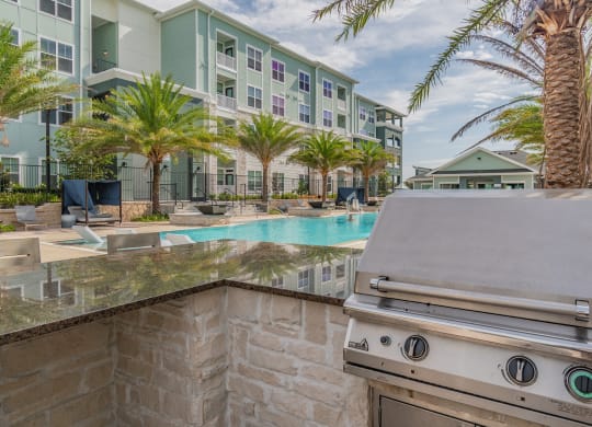 Outdoor Grill Area Overlooking The Pool & Sundeck