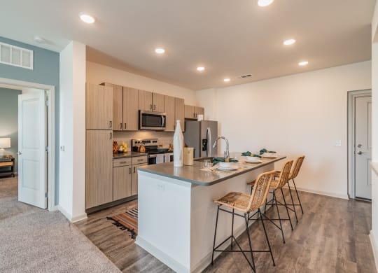 Kitchen Area With Wood-Style Flooring & Built-in Ceiling Lights