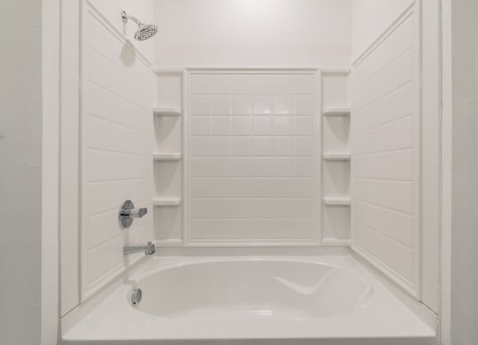 Tiled Shower With Built-In Shelving In The Shower