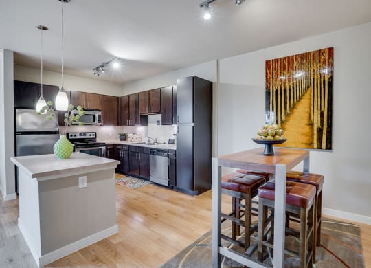 Spacious Kitchen with Island and Dining Area