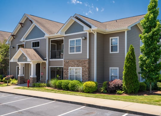 Lush Landscaping and Greenery in Front of Building 1200 at The Falls at 109