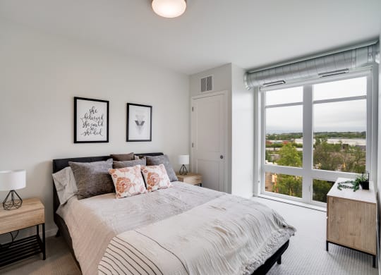 Large Floor to Ceiling Windows in Bedroom