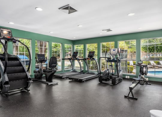 Cardio Equipment At The Fitness Center With Expansive Windows