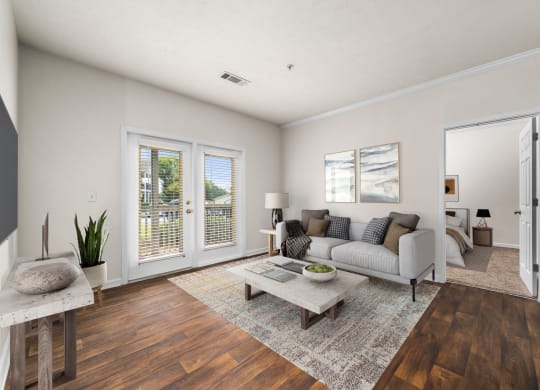 Spacious Living Area With Wood-Style Flooring