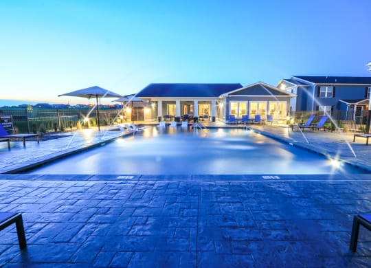 Resort-Style Pool Lit Up At Night
