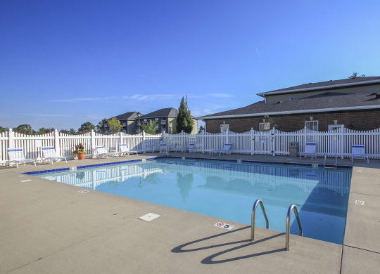 Pool and Sundeck with Lounge Chairs