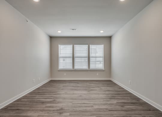 Spacious Living Room with Overhead Lighting