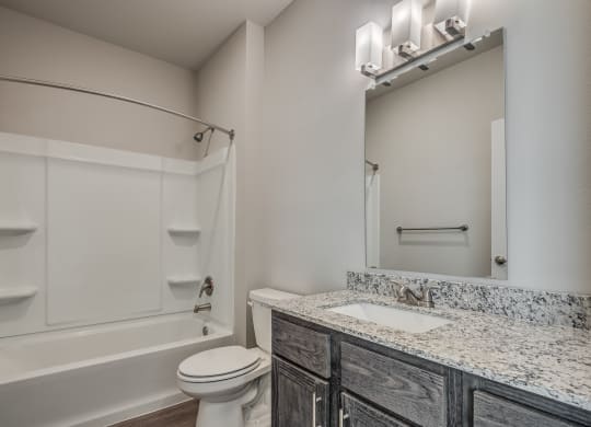 Bathroom With Granite Vanities
