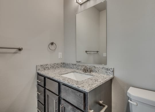 Bathroom With Granite Vanities