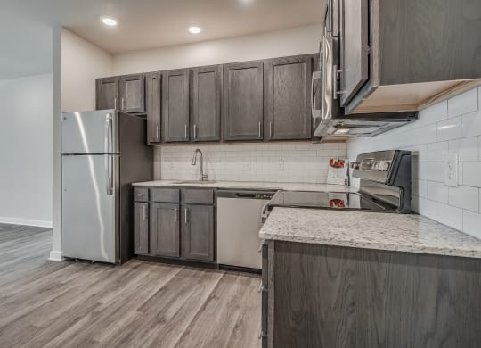 Kitchen with Granite Countertops and Stainless Steel Appliances