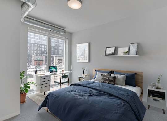 Bedroom with floor to ceiling windows