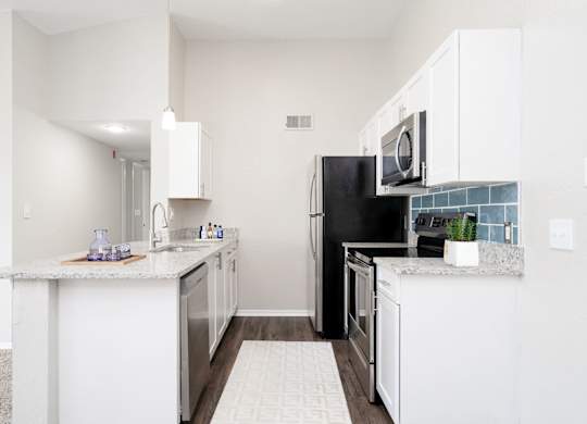 Fully Equipped Kitchen with Stainless Steel Appliances