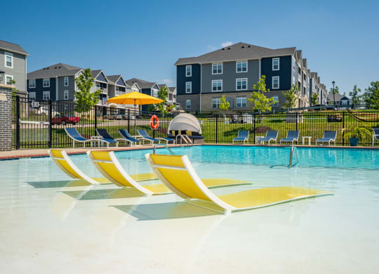 Sun Loungers Situated At The Zero-Entry Pool