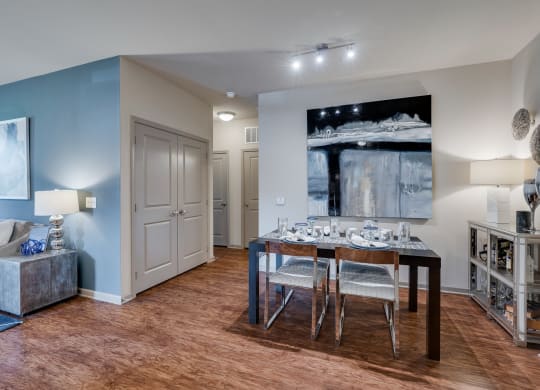 Spacious Dining Area With Wood-Style Flooring