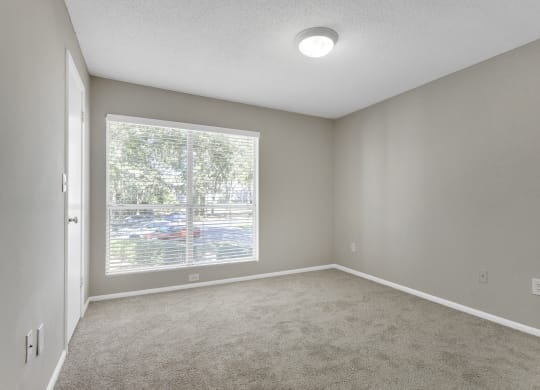 Spacious Bedroom with Large Windows