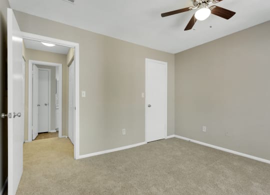 Spacious Bedroom With Ceiling Fan