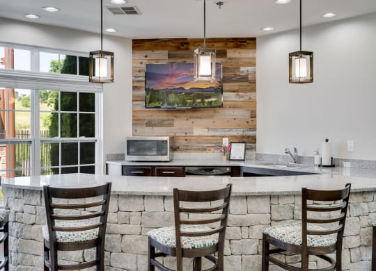Clubhouse Kitchen With Bar Stool Seating