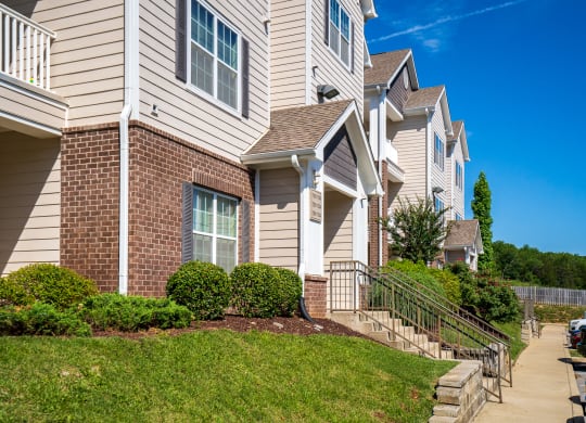 Lush Landscaping In Front Of Ashton Creek Farms Apartment Homes