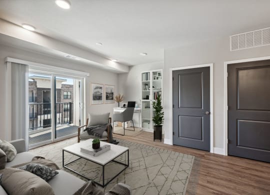 Spacious Living Area With Wood-Style Flooring