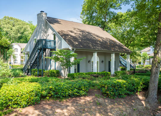 Leasing Center Surrounded by Lush Greenery and Landscaping
