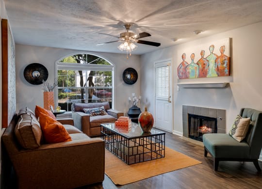 Spacious Living Room with Fireplace and Mantle
