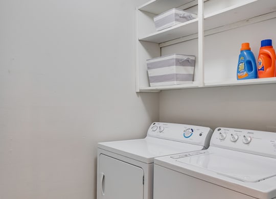 Washer and Dryer with Lots of Storage Space Above