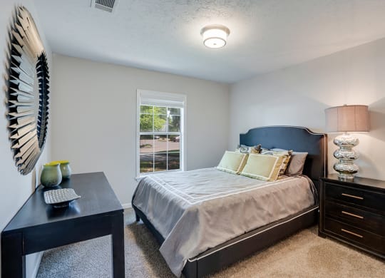 Bedroom with Tall Ceilings and Large Window