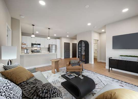 Spacious Living Area With Wood-Style Flooring