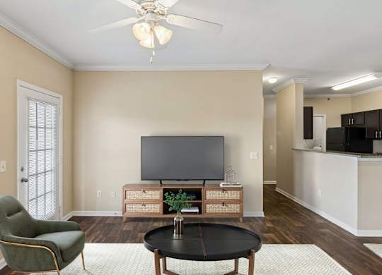 Spacious Living Area With Wood-Style Flooring