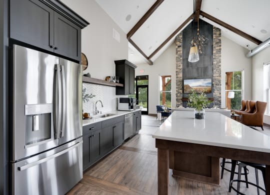 Clubhouse Kitchen with Large Kitchen Island and Stainless Steel Appliances
