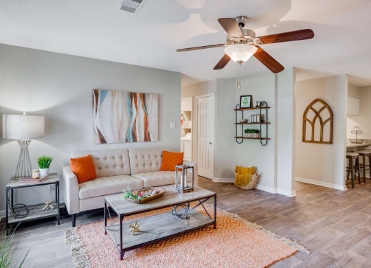 Open Concept Living with Ceiling Fan and Light