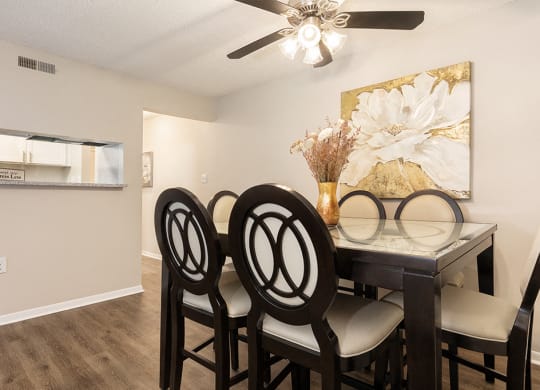 Dining Room Area Adjacent to the Kitchen with Peek Through Window