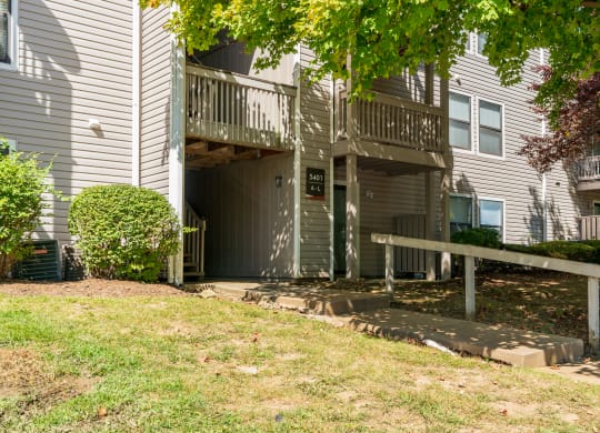 Paved Walkway Leading up to an Apartment Building at The Finn
