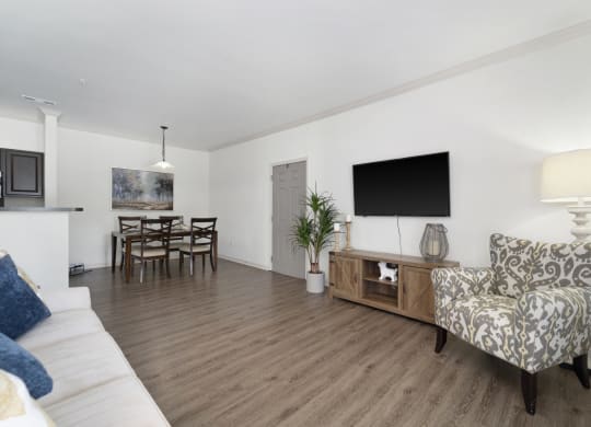 Spacious Living Area with Hardwood-Style Flooring