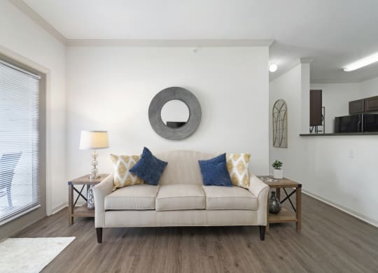 Spacious Living Area with Hardwood-Style Flooring