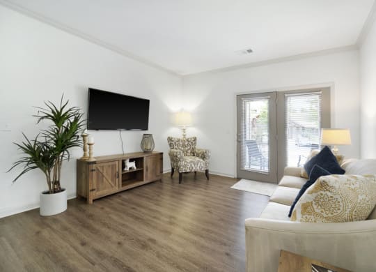 Spacious Living Area with Hardwood-Style Flooring