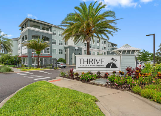 a building with a sign that reads three