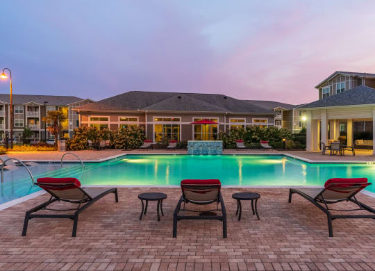 Sundeck & Pool Lit Up At Night