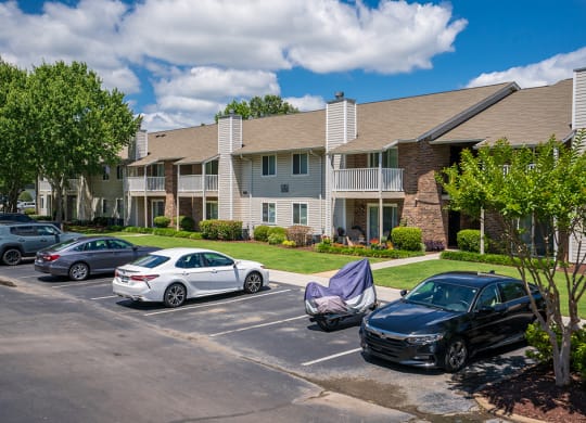 Parking Lot in Front of The Villas at Oak Crest Apartment Building